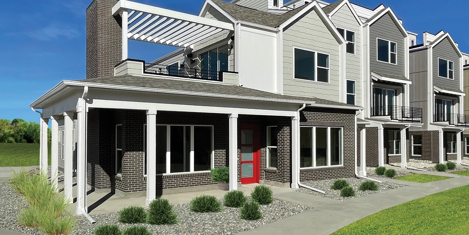 Modern townhouse exterior with a red door, brick facade, and flat rooftop patio under a pergola structure